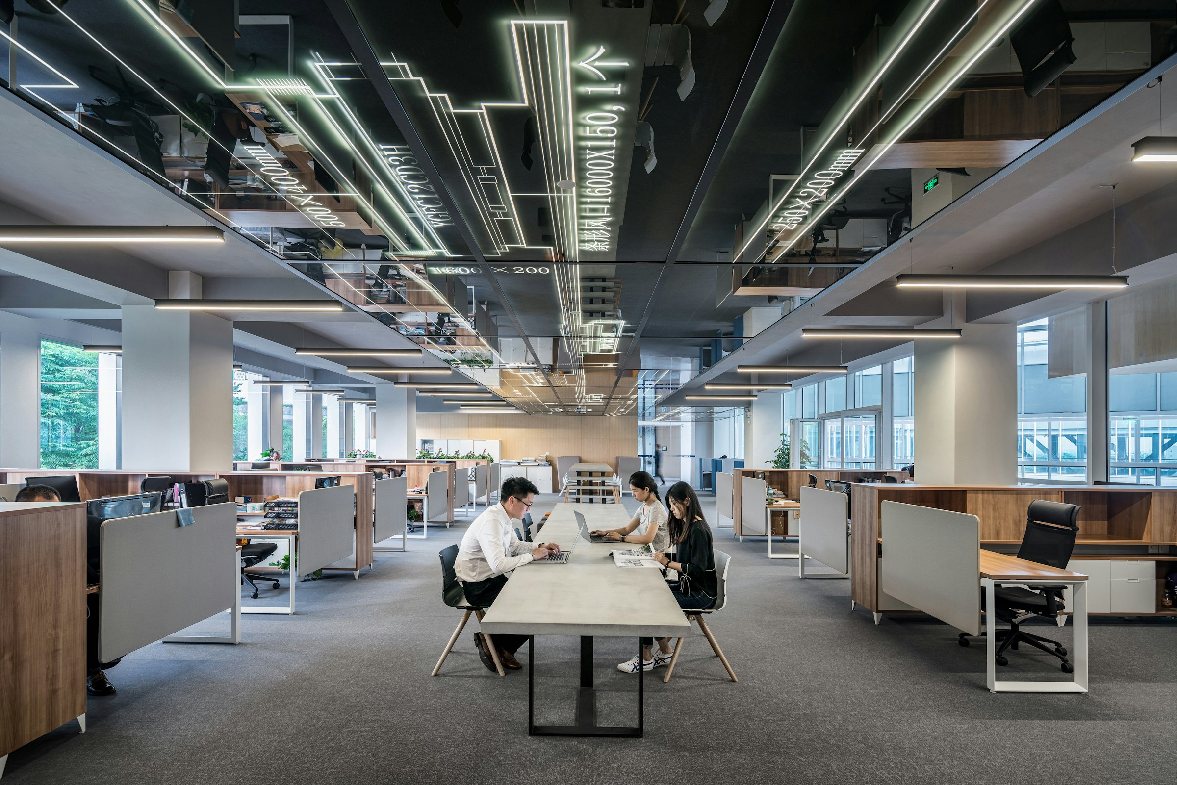 Open plan office with teams at work
